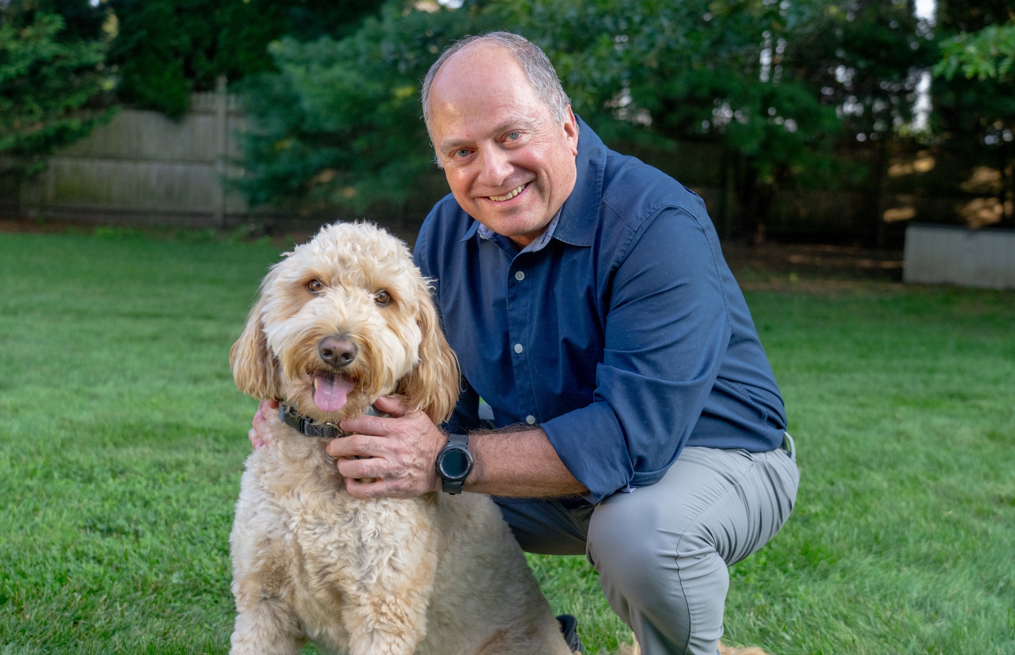 Photograph of Ken Block and his dog